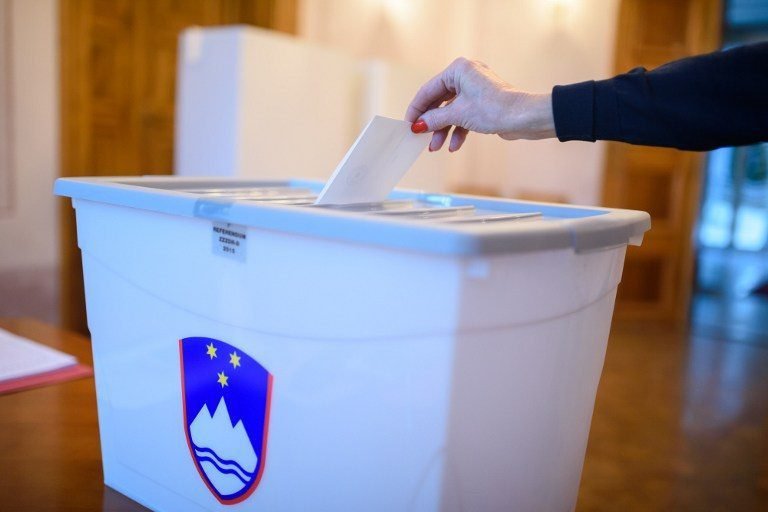 A Slovenian citizen casts a ballot at a polling station in Bled Slovenia on December 20, 2015, in a referendum on whether to allow the largely-Catholic EU member state to become Europe's first ex-communist country to allow same-sex marriage.