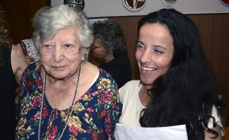 The woman supposed-to-be Clara Anahi Teruggi (R), 120th granddaughter who was snatched from her mother and identified by Abuelas de Plaza de Mayo (Grandmothers of Plaza de Mayo) hugs María (Chicha) Mariani, in Buenos Aires on December 24, 2015. In a Christmas gift gone awry, the woman thought to be the lost granddaughter of an activist who searches for babies stolen during Argentina's 1976-1983 military dictatorship turned out to be someone else. Two DNA tests -- one in early 2015 and the other made public on December 25, 2015 -- showed no relationship between the two women, said Pablo Parenti, head of the government office that searches for children kidnapped during the dictatorship. AFP PHOTO / TELAM - Carlos CERMELE /// RESTRICTED TO EDITORIAL USE - MANDATORY CREDIT "AFP PHOTO / TELAM - Carlos CERMELE" - NO MARKETING NO ADVERTISING CAMPAIGNS - DISTRIBUTED AS A SERVICE TO CLIENTS  GETTY OUT / AFP / TELAM / Carlos Cermele