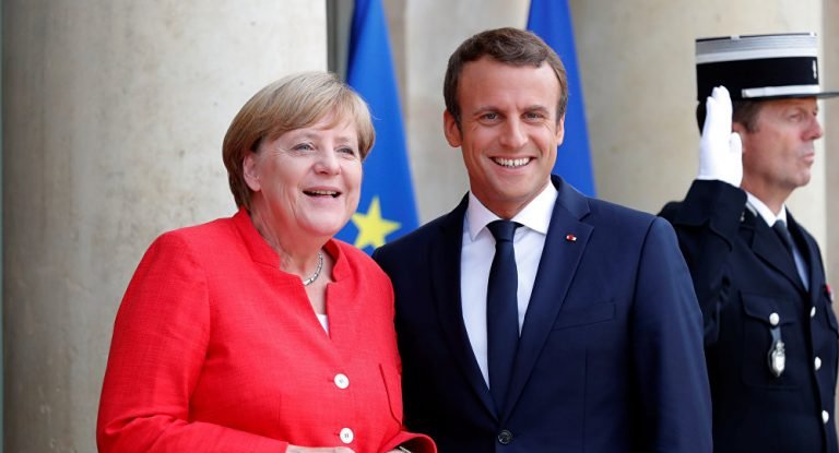 Merkel y Macron presionan para que Rusia coopera en tregua en Siria